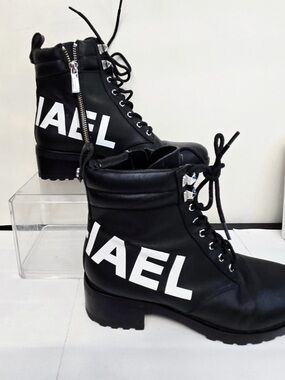 MICHAEL Michael Kors Black Lace-Up Combat Boots with White Logo